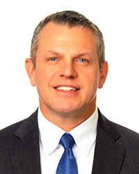Portrait of Dr. Jason E. Glass